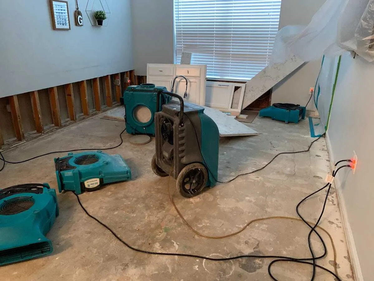 Dehumidifier in flood-cut room for Water Damage Restoration in Glennville